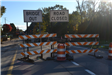 Road closed and bridge out signs