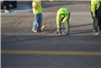 Striping Crew Removing Old Striping