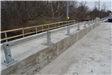 Bridge Barrier Between Road and Pedestrian Walkway