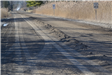 Dirt Pile Grader Has Pulled to Build up the Crown of a Gravel Road