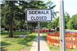 Sidewalk closed sign along Greenfield Rd. between 13 and 14 Mile Rds.