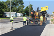 Paver on westbound Walton Blvd. between Sashabaw Rd. and Dixie Hwy. in Waterford Township 