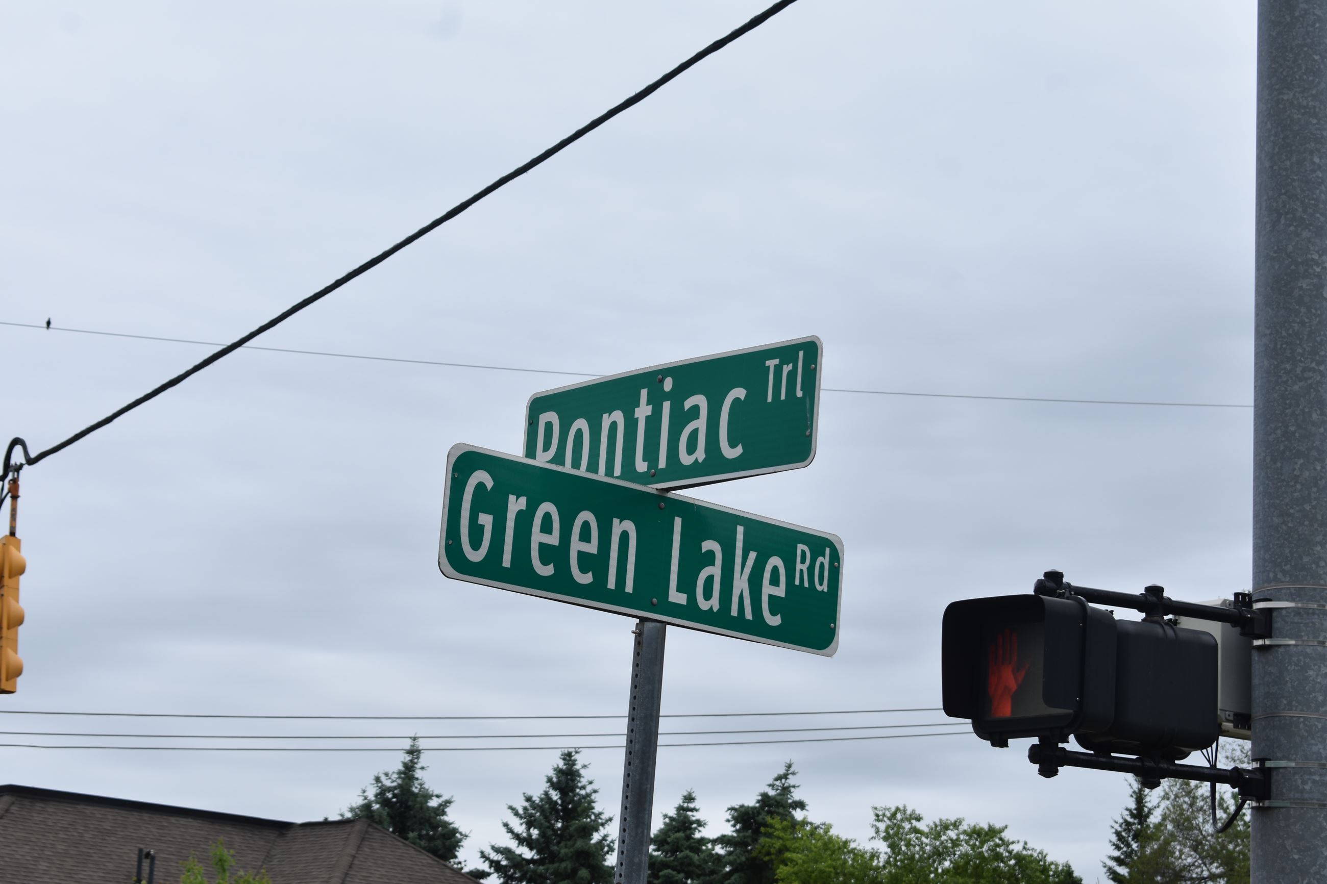 Pontiac Trail/Green Lake Road intersection sign