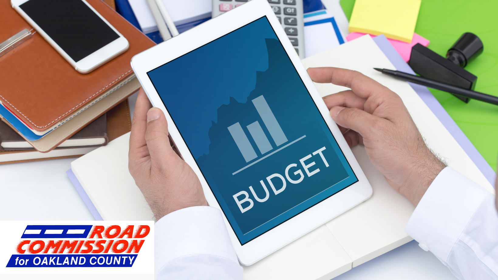 24-25 budget budget image with books and a tablet 