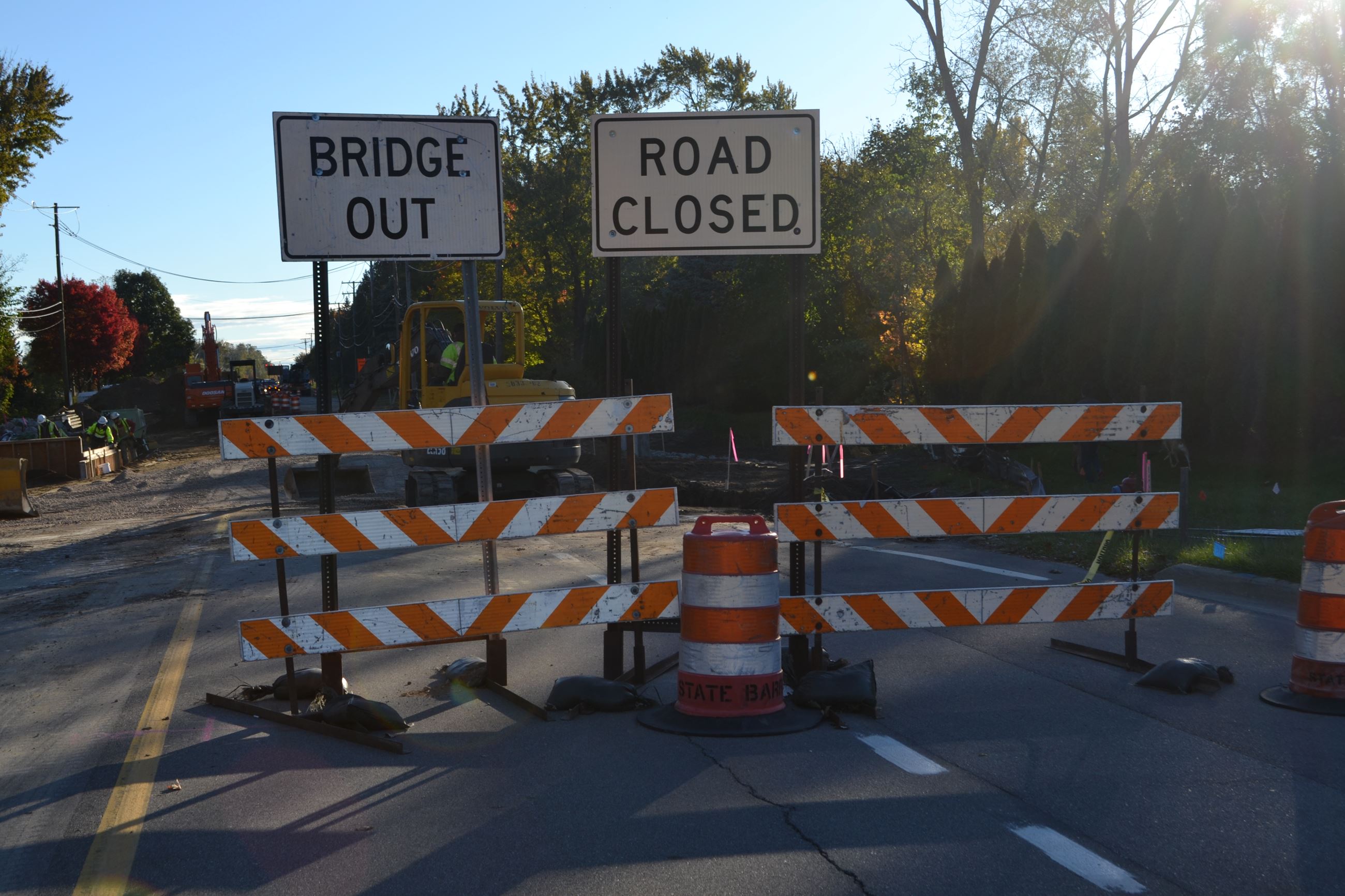 Road closed and bridge out signs