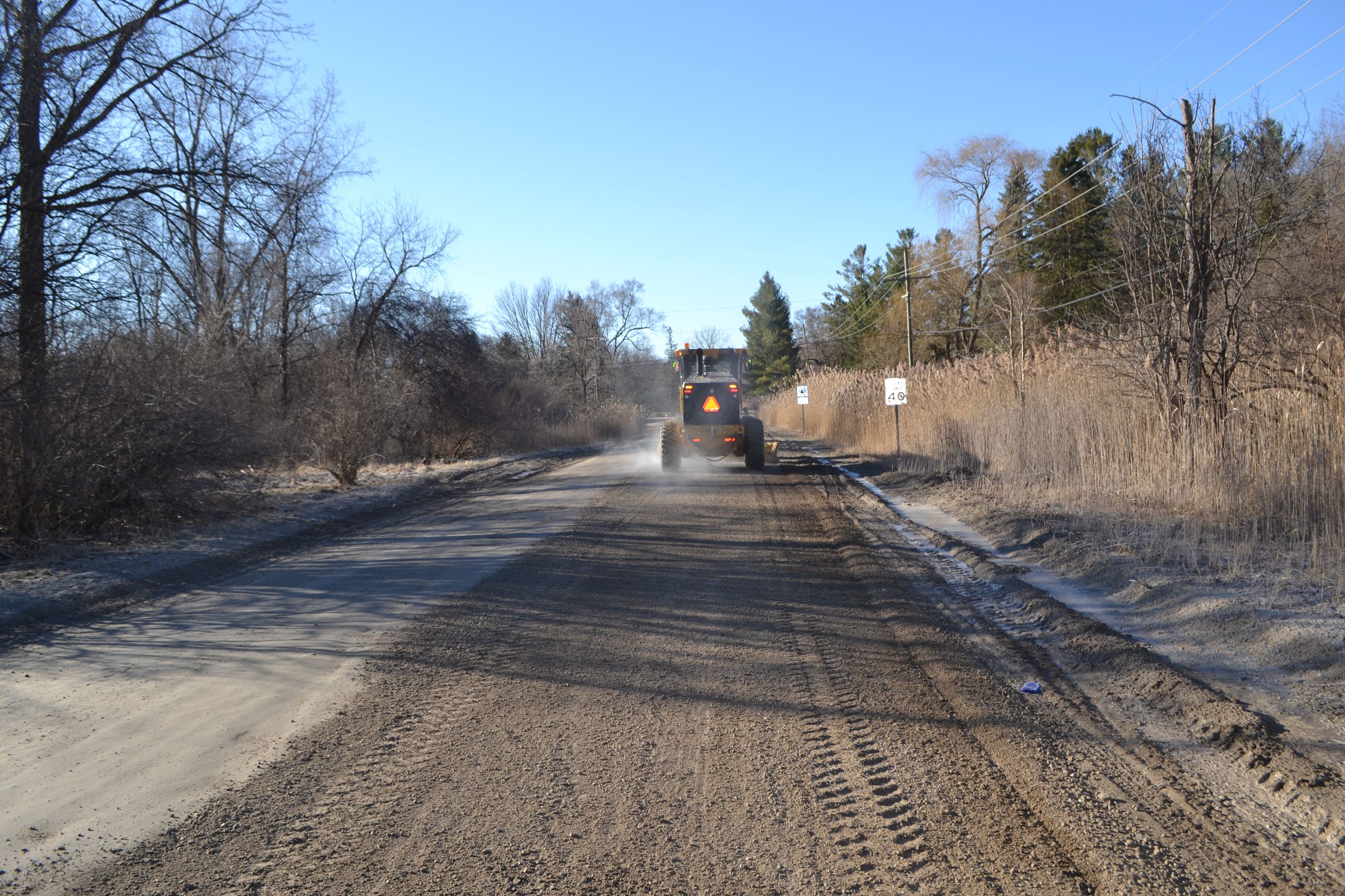 Rear View of Grader on Livernois Road Near Dutton Road