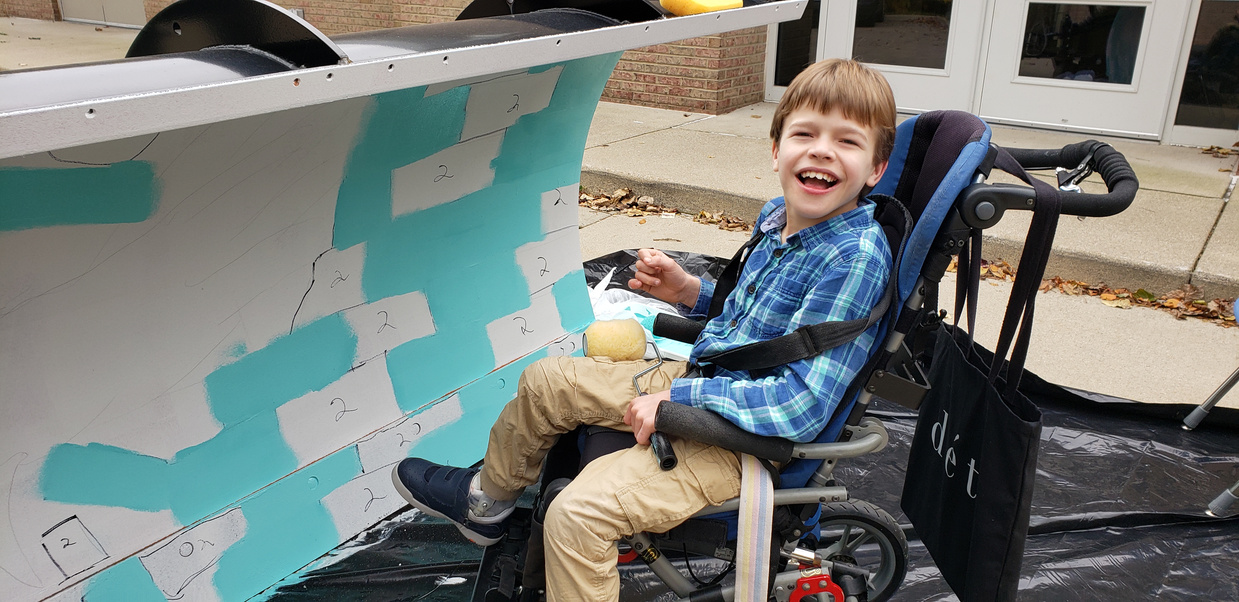 Student with a Roller Preparing to Paint the Plow