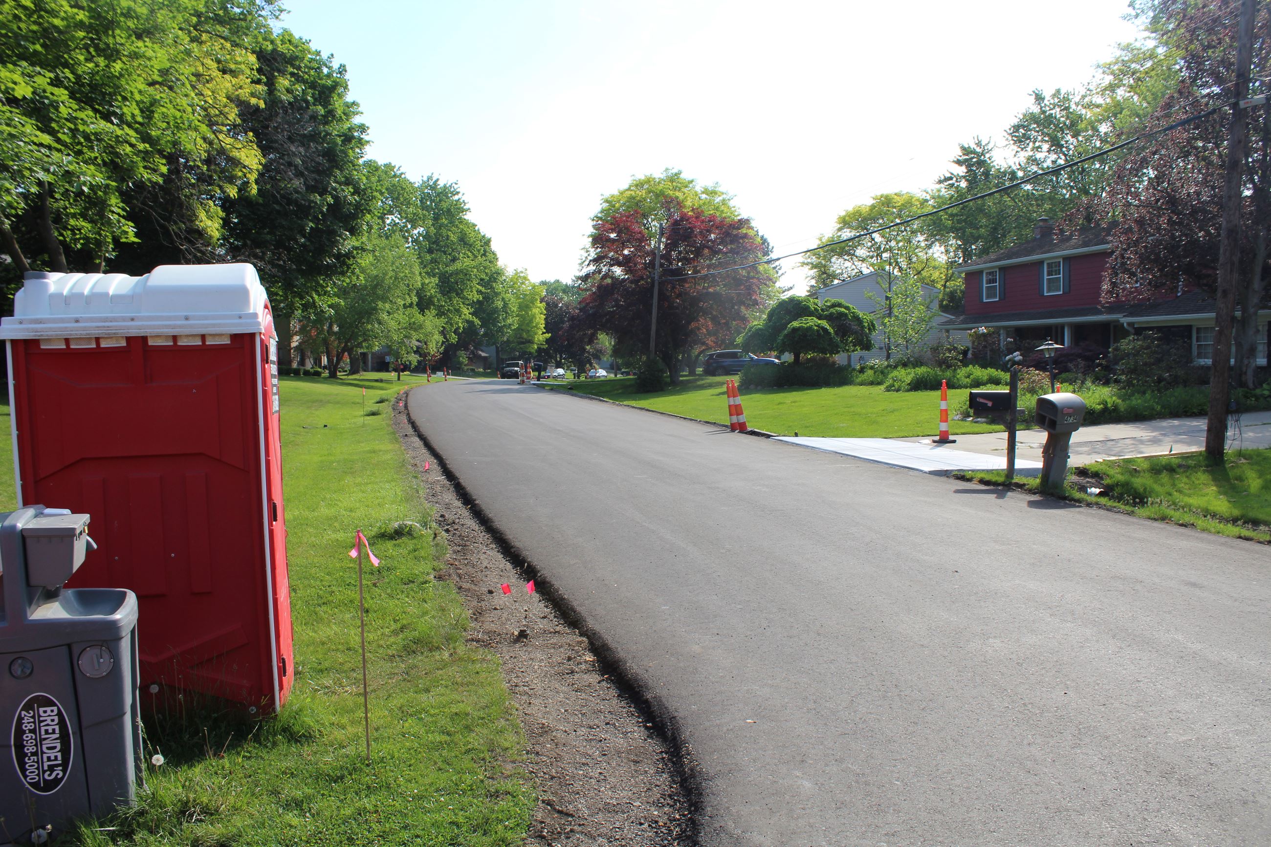 Firs lift of hot mix asphalt on Kingsmill Dr. as part of the Kirkwood S.A.D in Bloomfield Twp.