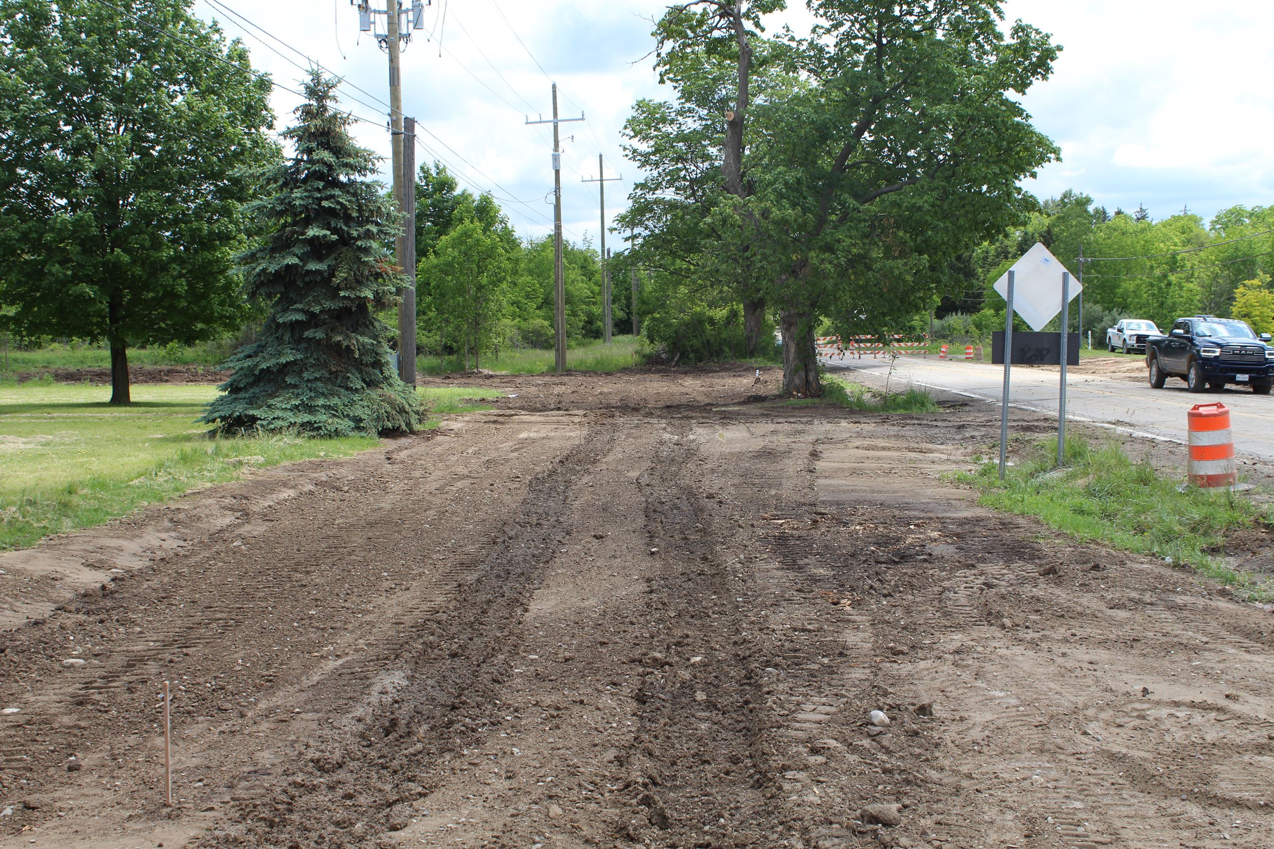 New utility lines at the 8 Mile and Currie Road intersection pre roundabout construction.