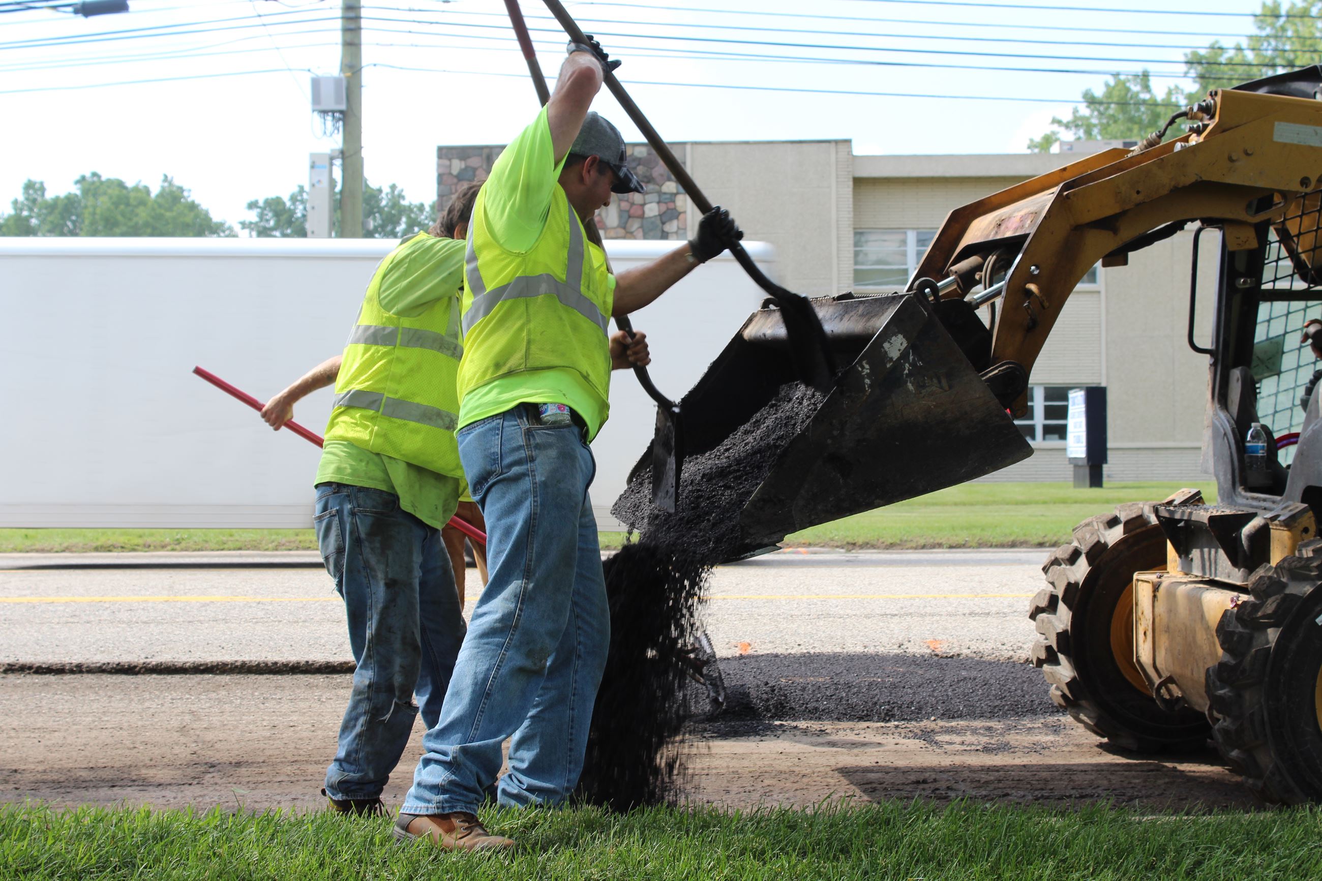 Preparing to pave 8 Mile Road spot resurfacing sections just west of Tuck Road