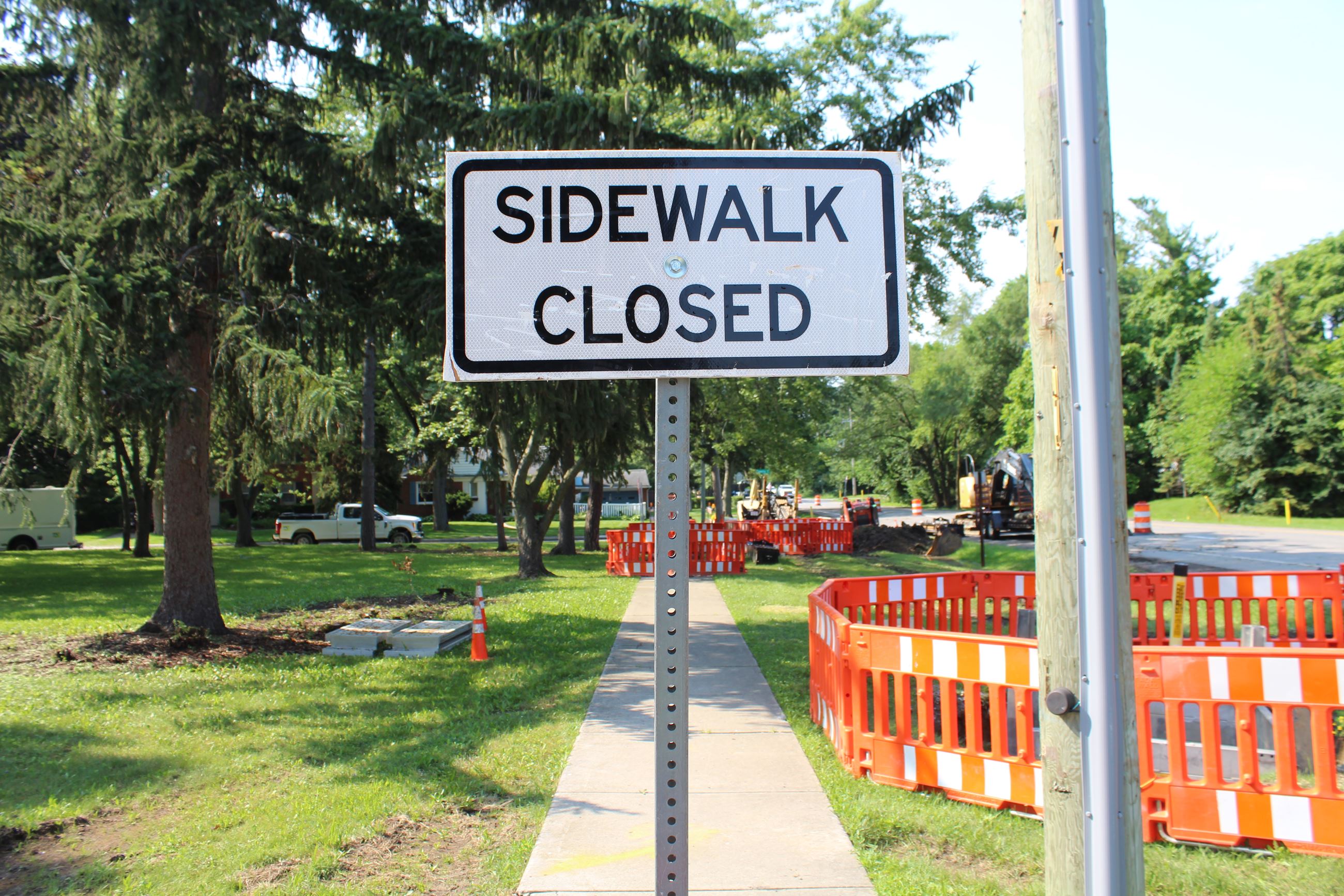 Sidewalk closed sign along Greenfield Rd. between 13 and 14 Mile Rds.