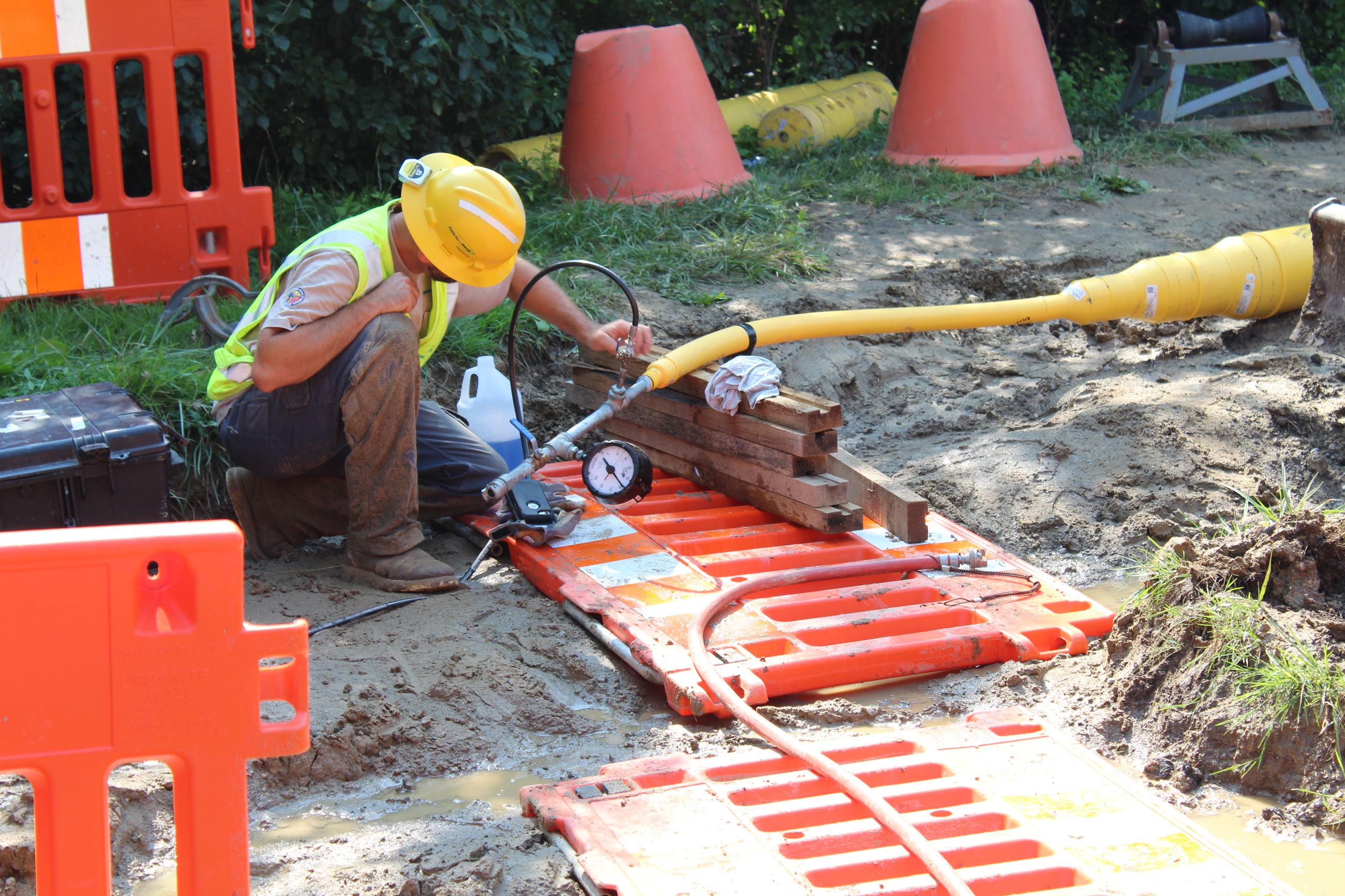 Consumers Energy worker working on gas main along Greenfield Rd. just north of Sheridan Dr.