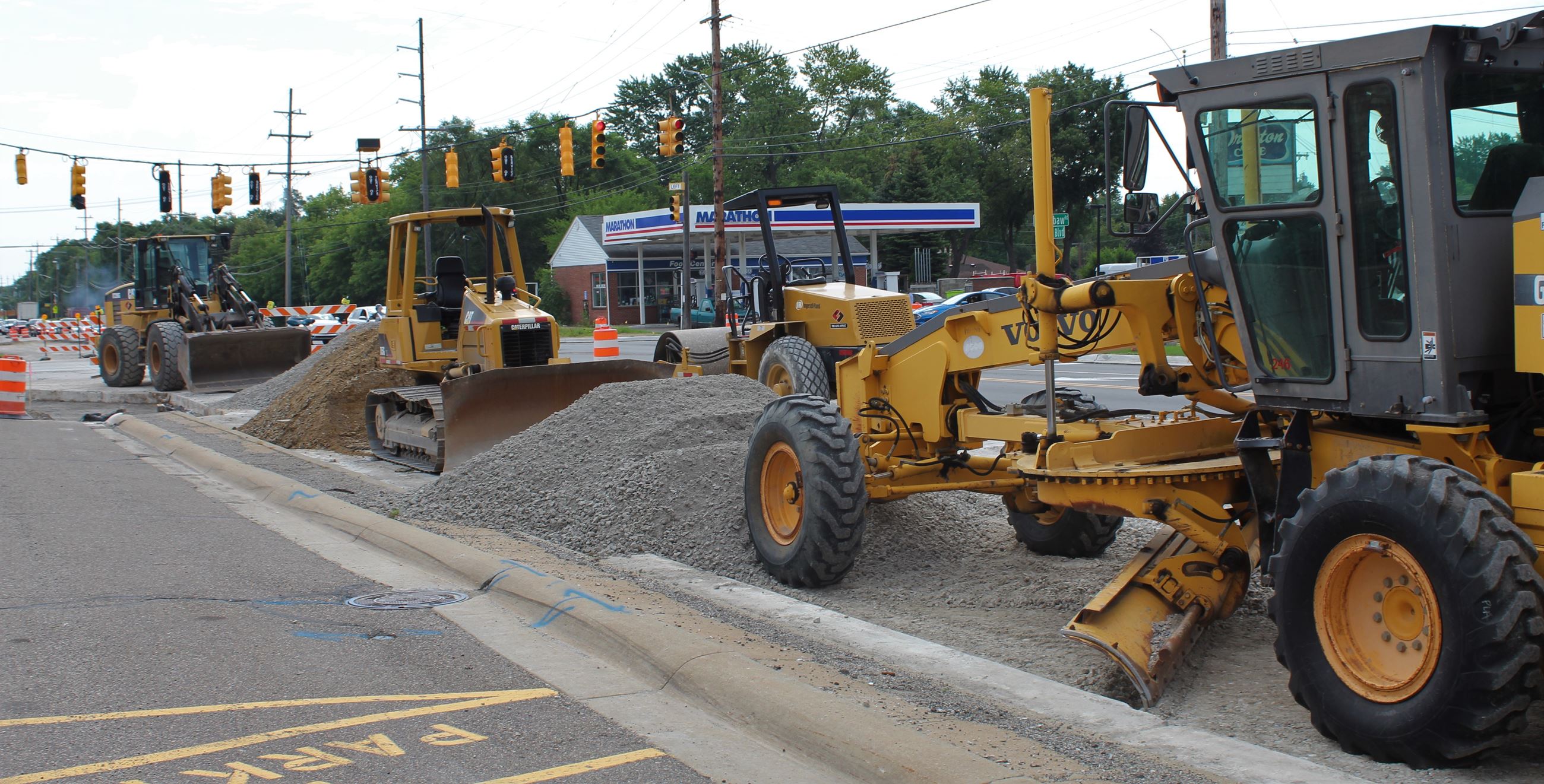 Grader and loaders on Walton Blvd. at the Sashabaw Rd. intersection in Waterford Township