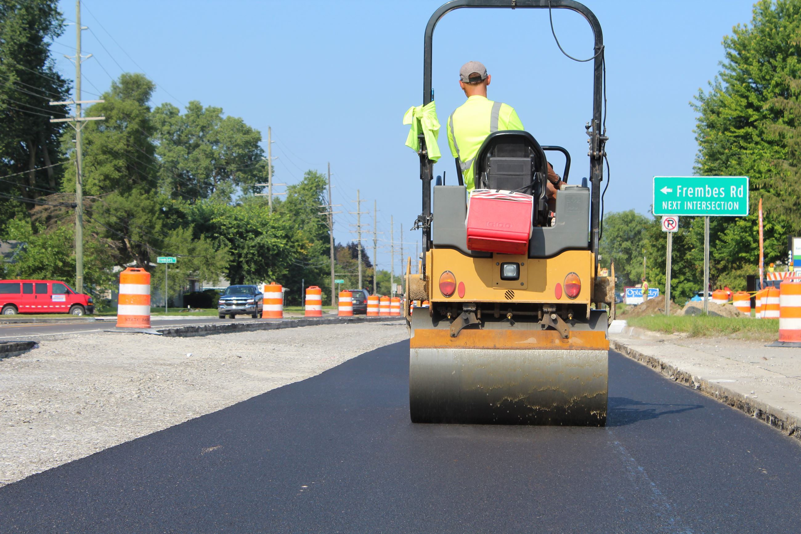 Roller on Walton Blvd. with Frembes Rd. sign in background, in Waterford Township
