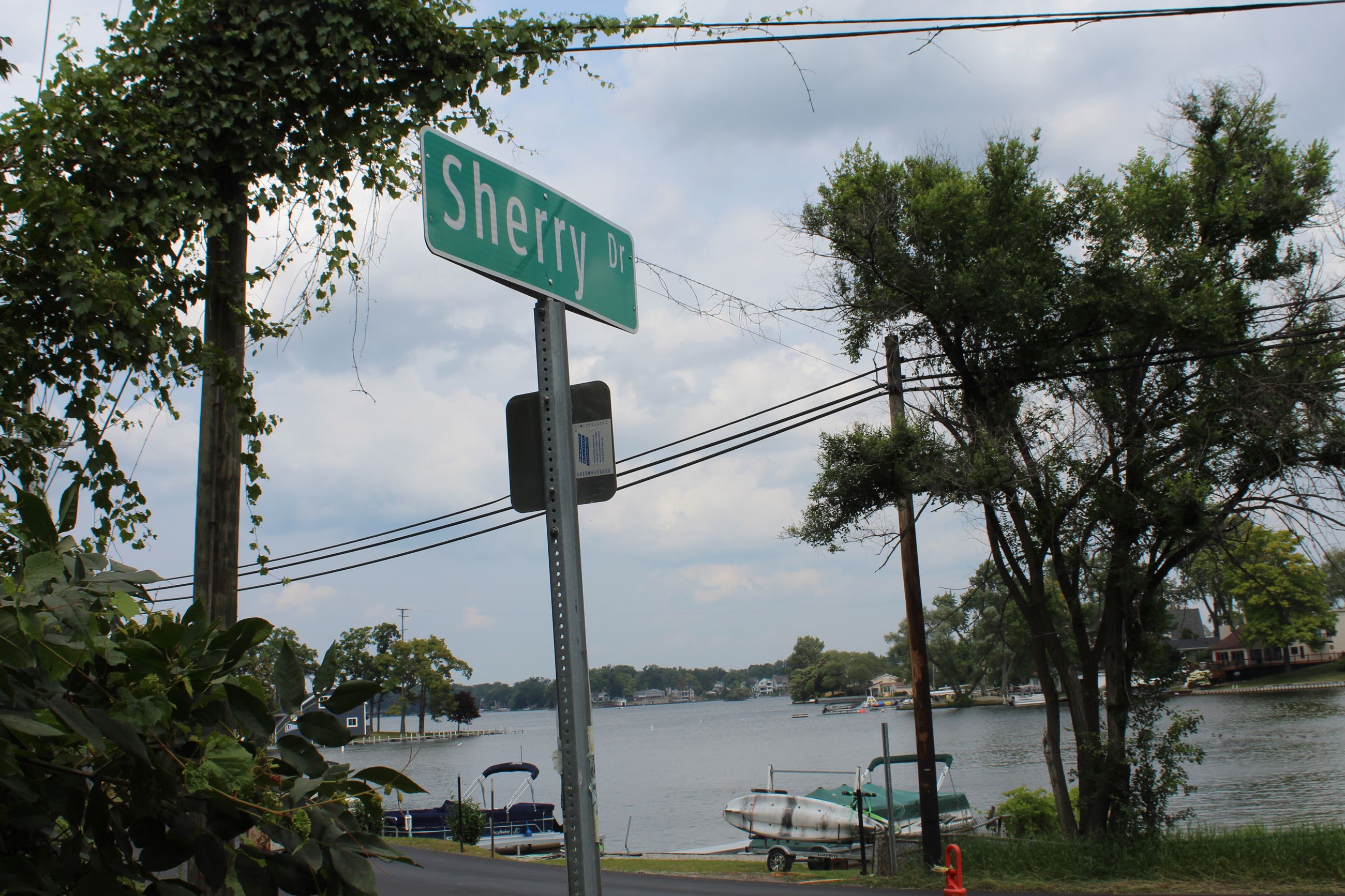 Sherry Dr. street sign at the freshly paved Heights Rd. intersection in Orion Township