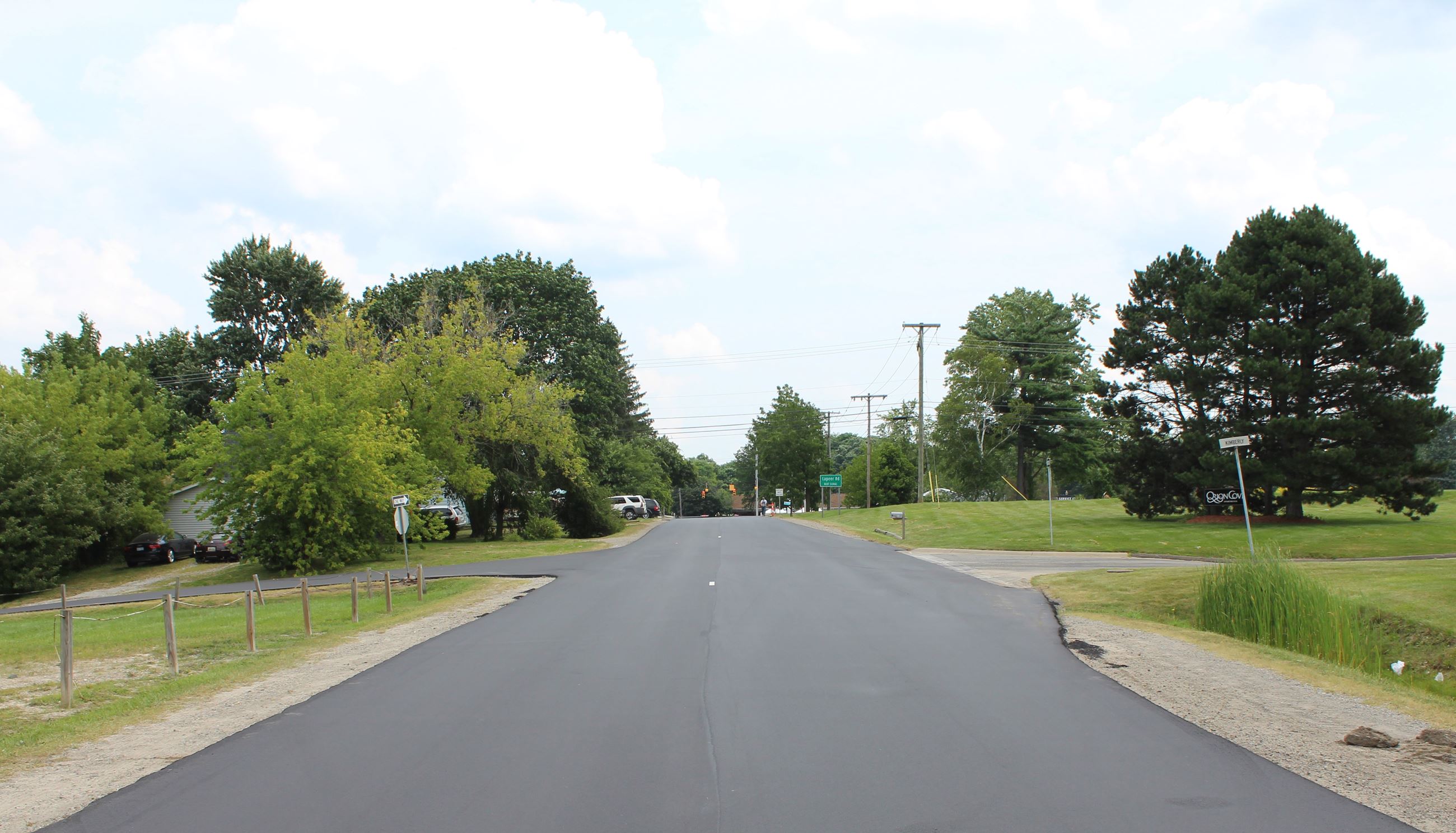 Odanah Ave. just west of Lapeer Rd. looking toward the Lapeer Rd. intersection in Orion Township