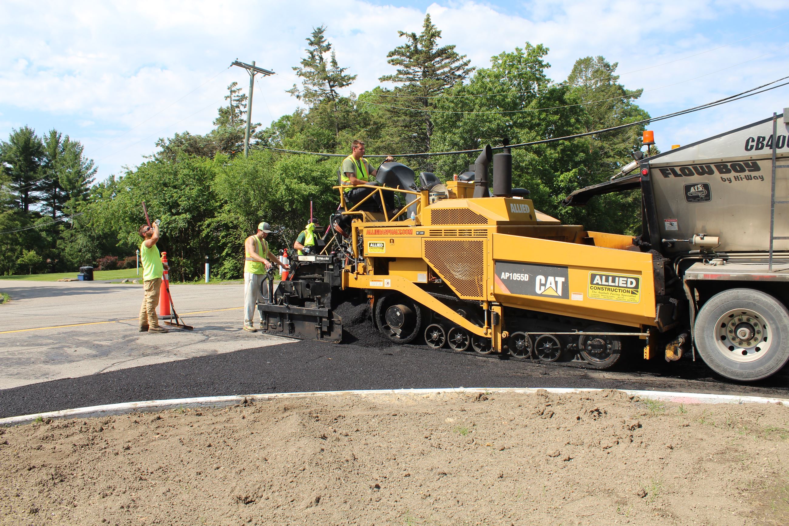 Paving crew at the Sutters Ln. entrance to the Kirkwood SAD district in Bloomfield Township