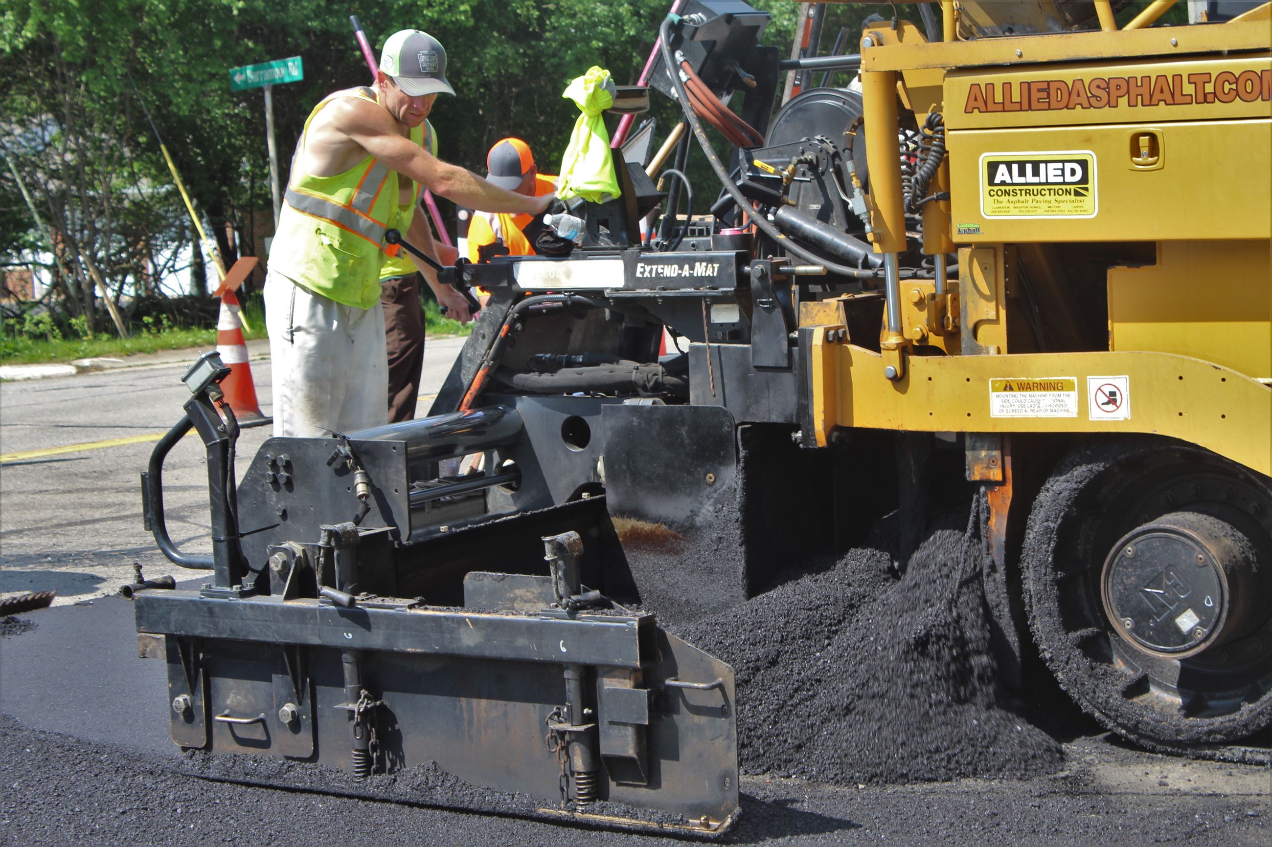 Paving with hot mix asphalt on Sutters Ln. in the Kirkwood SAD district in Bloomfield Township