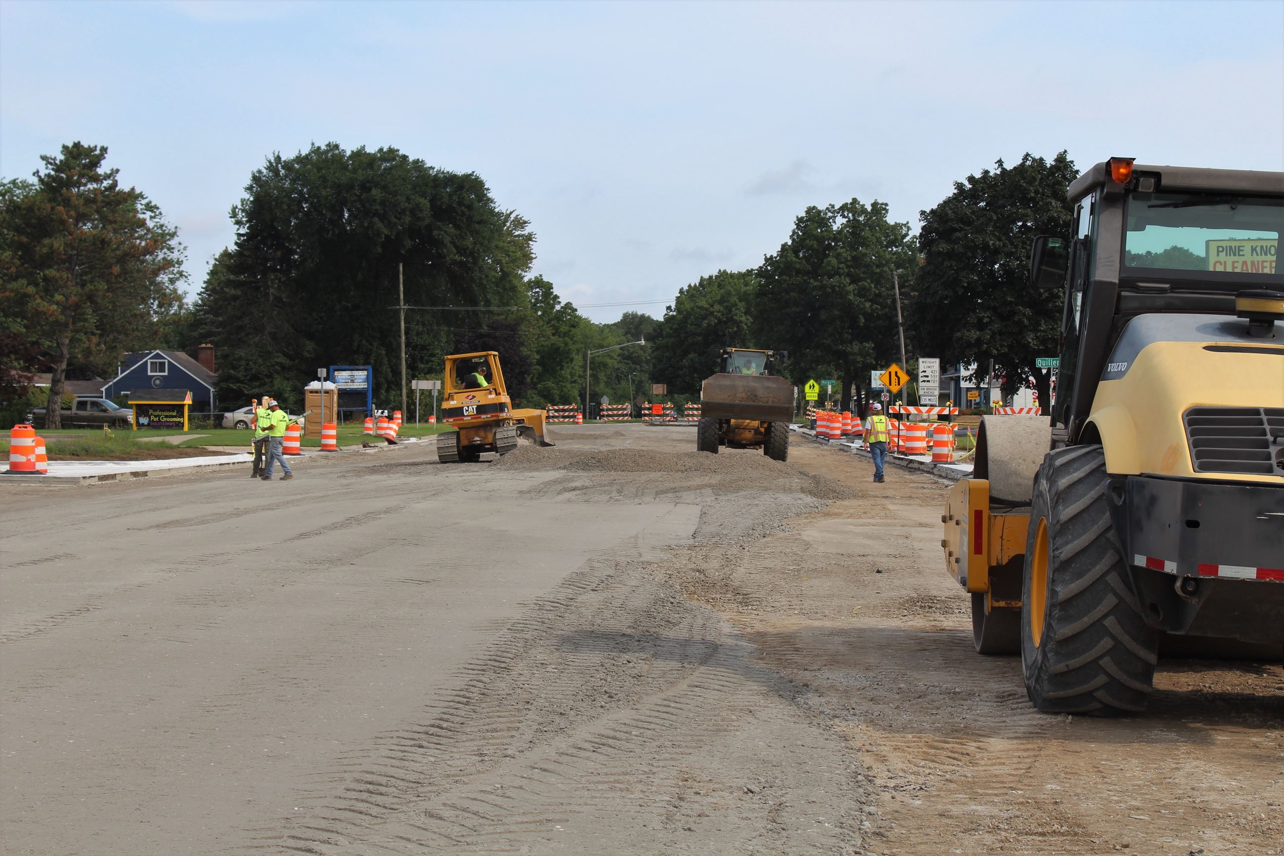 Leveling the north leg of the Walton Blvd. / Sashabaw Rd. intersection ahead of paving in Waterford Township